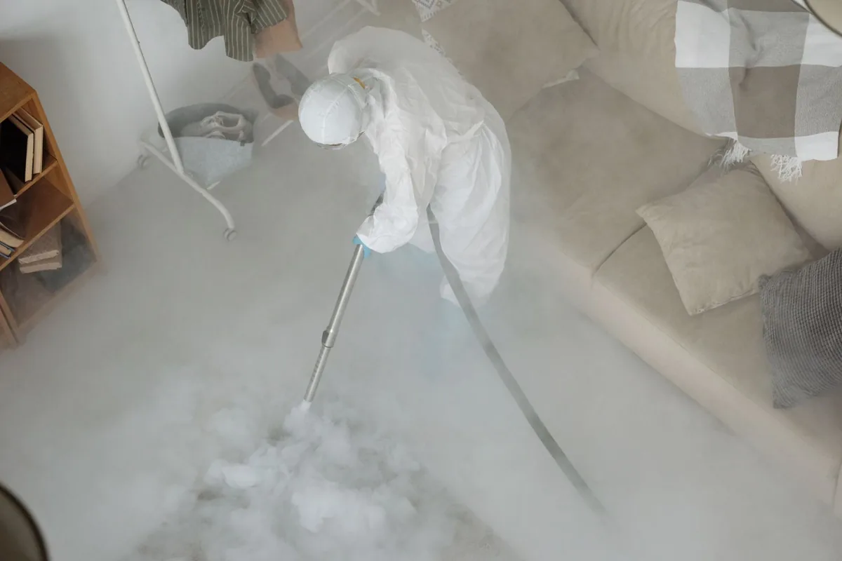 Biohazard cleanup technician in protective equipment, Southern Shops, SC